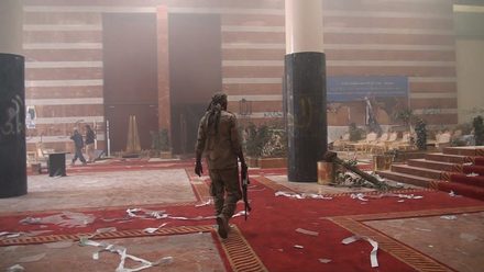A fighter walking through a ruined hall